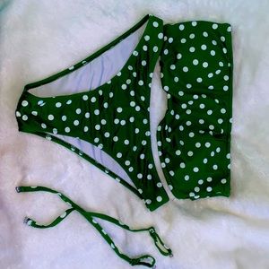 Dark green swimsuit with detachable straps. White polka dots, never worn.